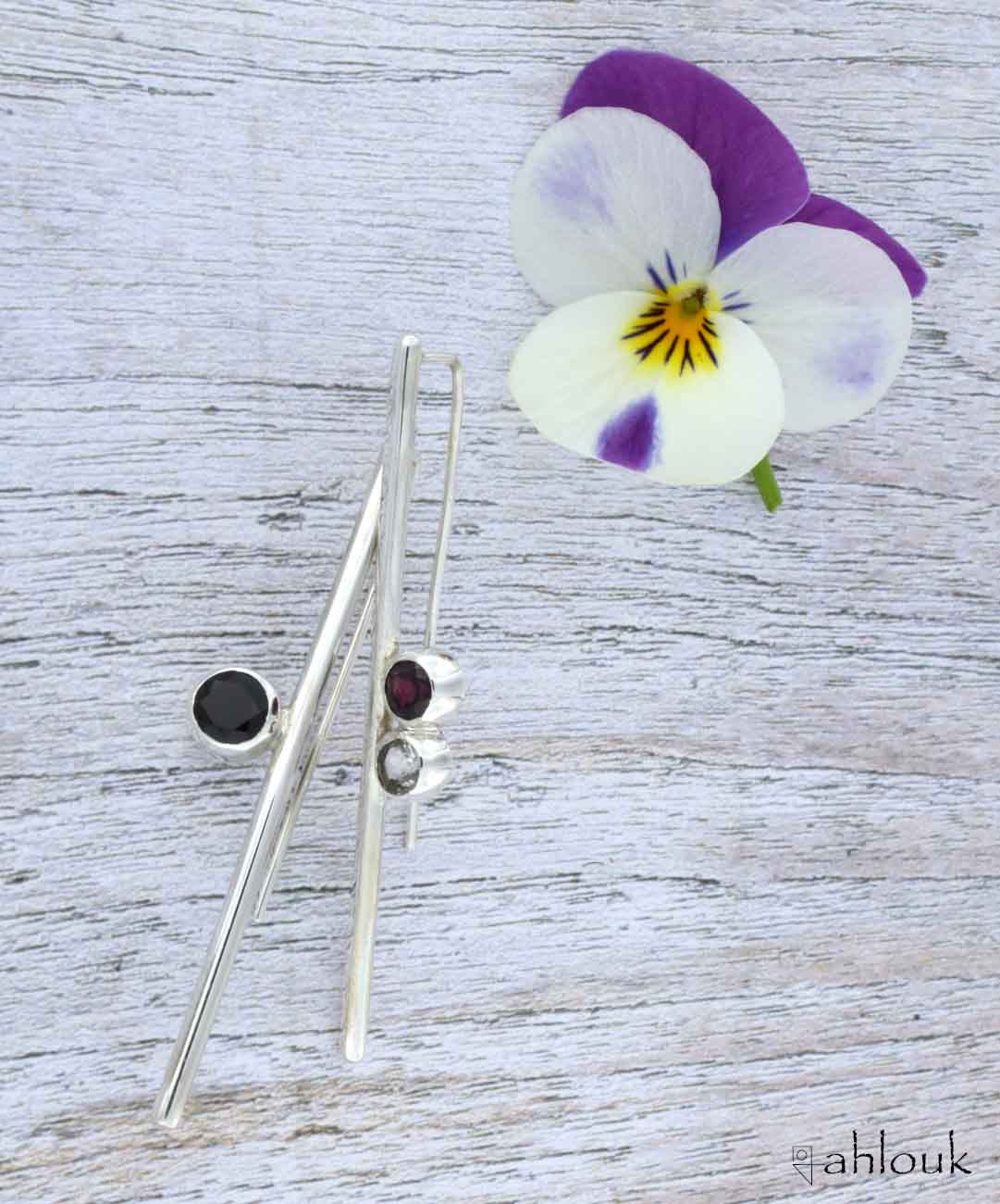 Orecchini lunghi con pietre